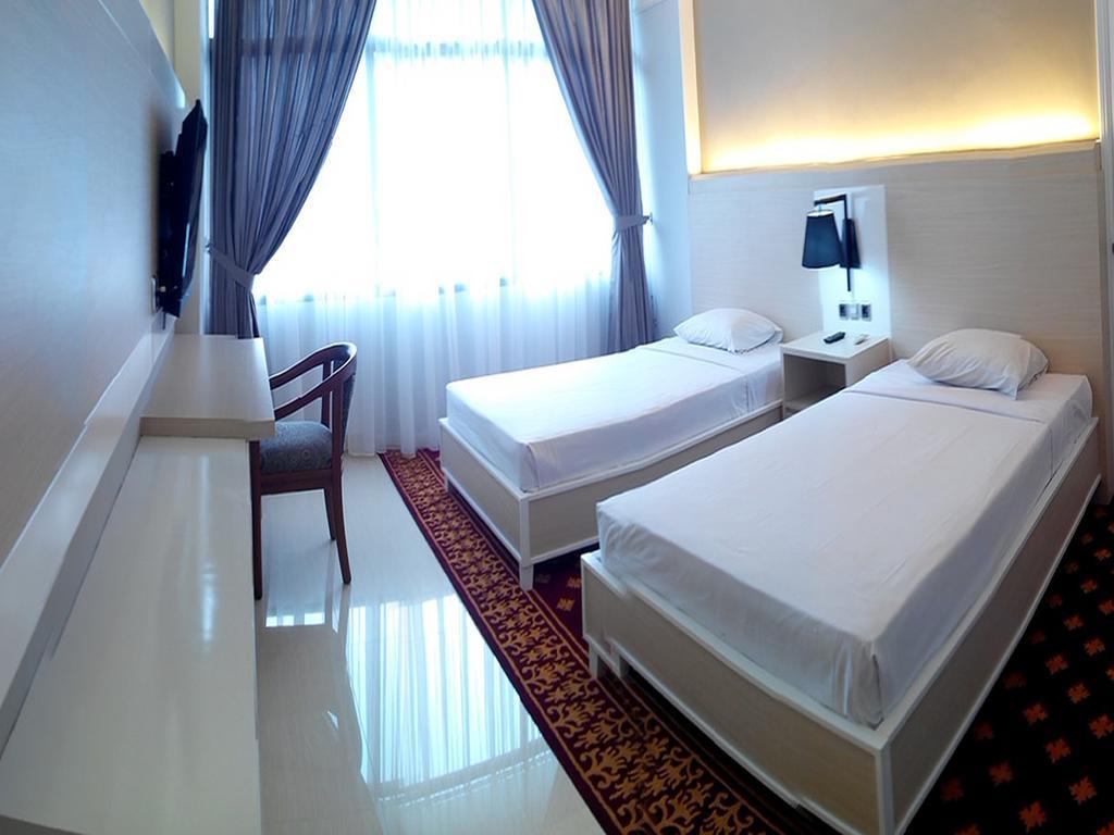 פאלמבאנג Hotel Sandjaja חדר תמונה